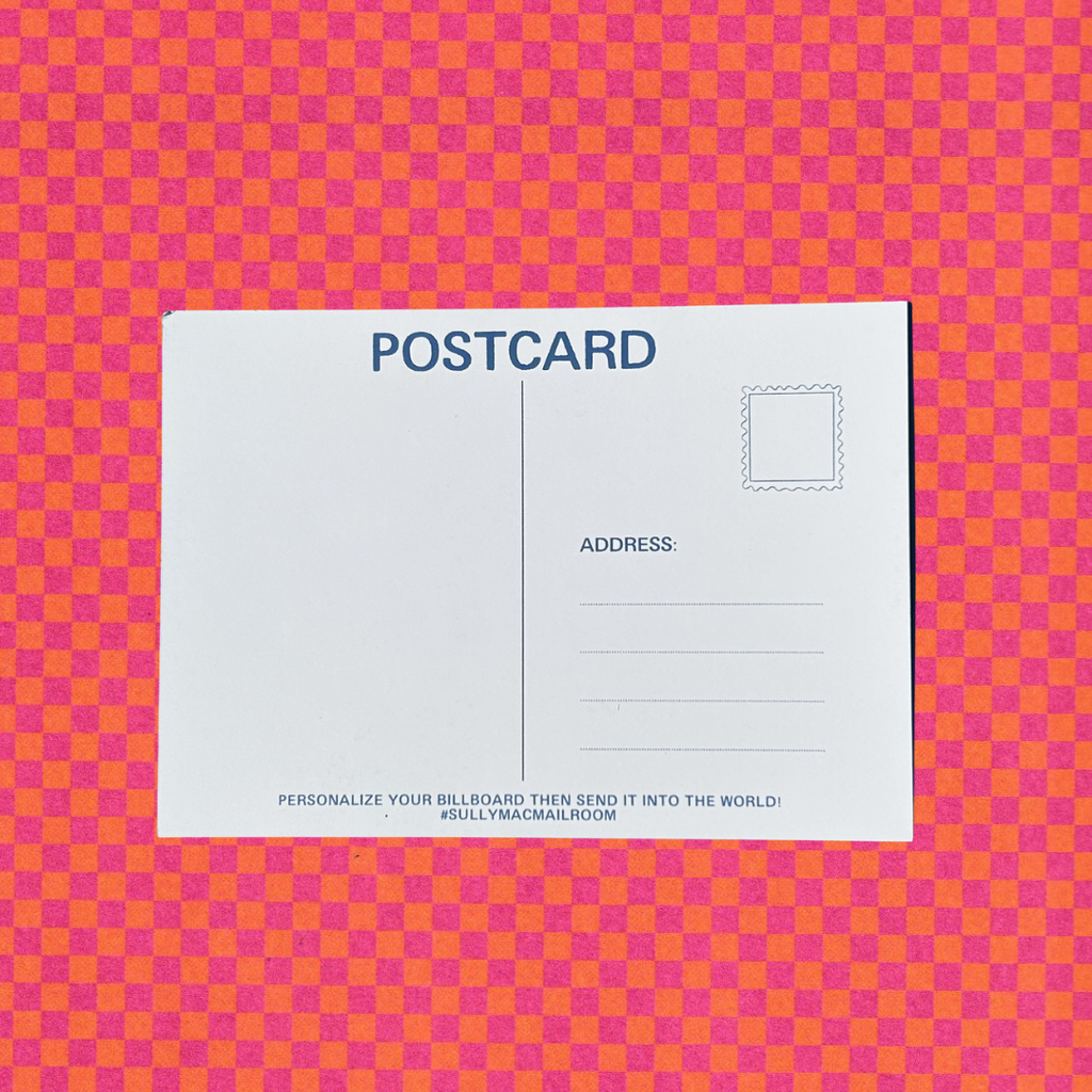 The Sully Mac Mailroom Postcard on a pink and orange checkered background. 